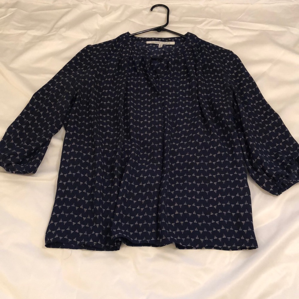 Navy blue blouse with cream designs